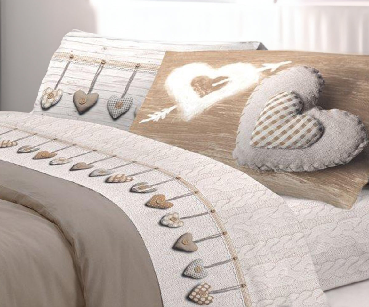 Completo letto matrimoniale beige composto da lenzuola e federe con fantasia stampata