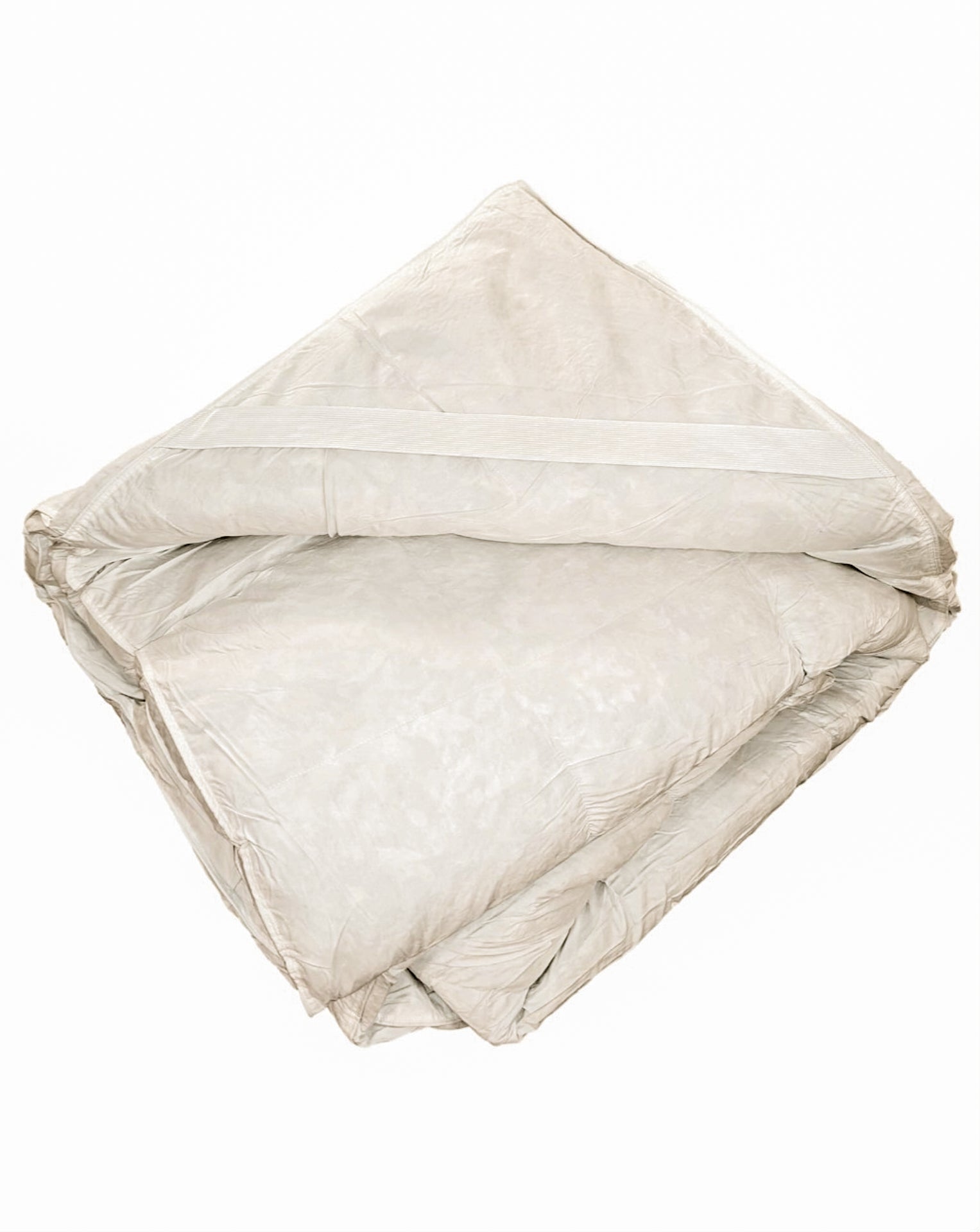 Topper con elastici agli angoli fissato sul materasso